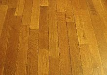 木头可以切成直的木板，做成木地板。